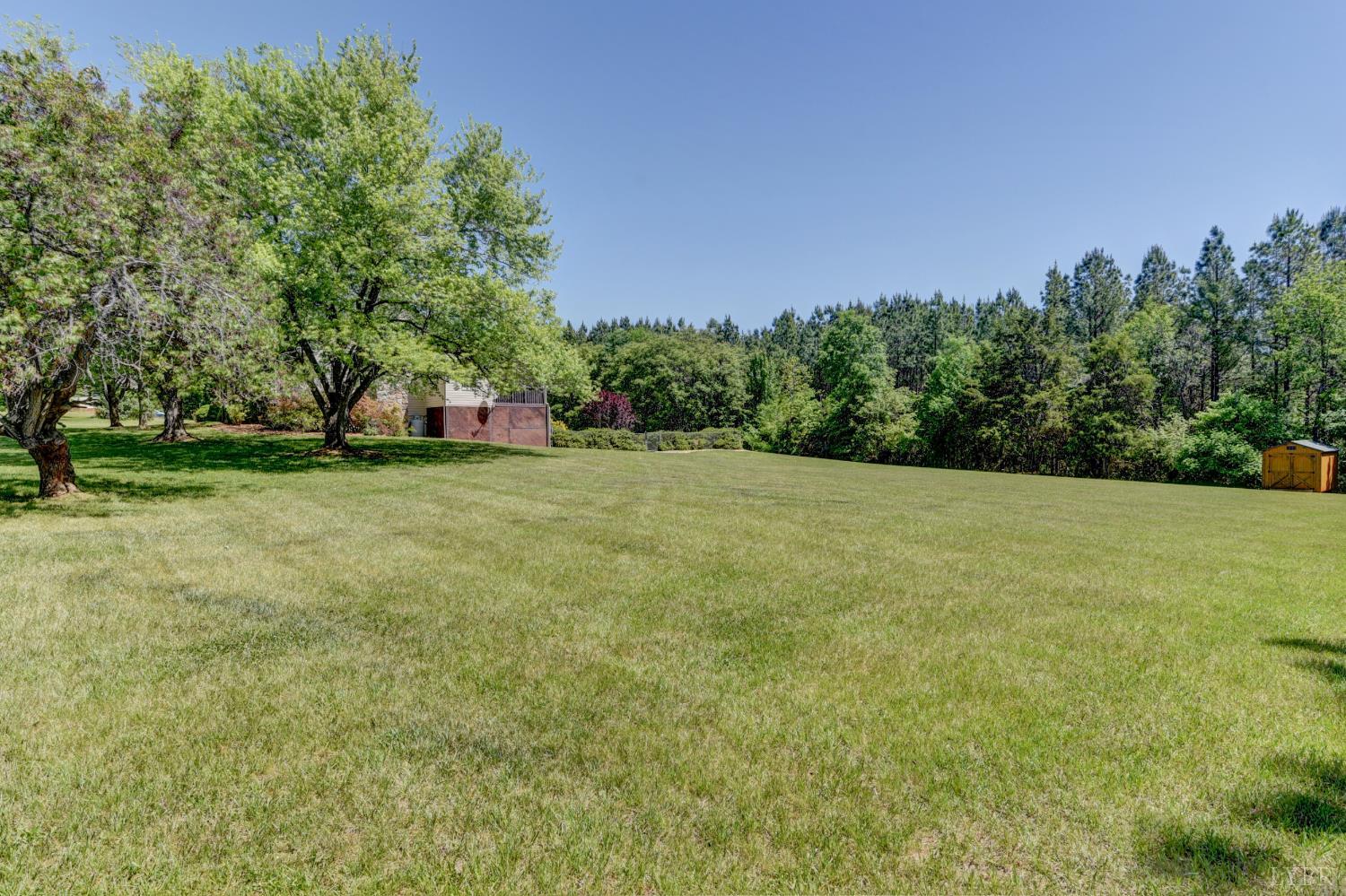 151 Anderson Place Rustburg, VA 24588 - Photo 52 of 57 a backyard of a house with lots of green space