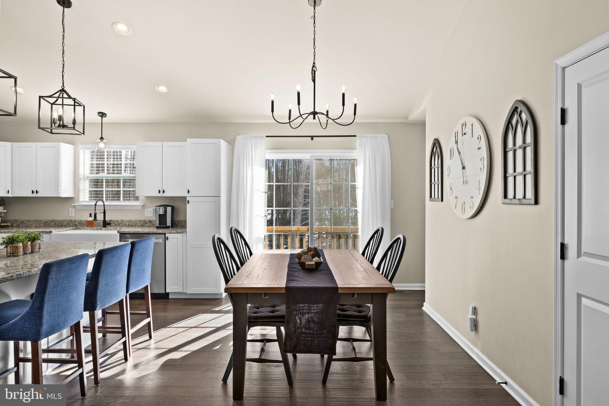 5269 Macedonia Road Woodford, VA 22580 - Photo 11 of 37 a view of a dining room with furniture window and wooden floor