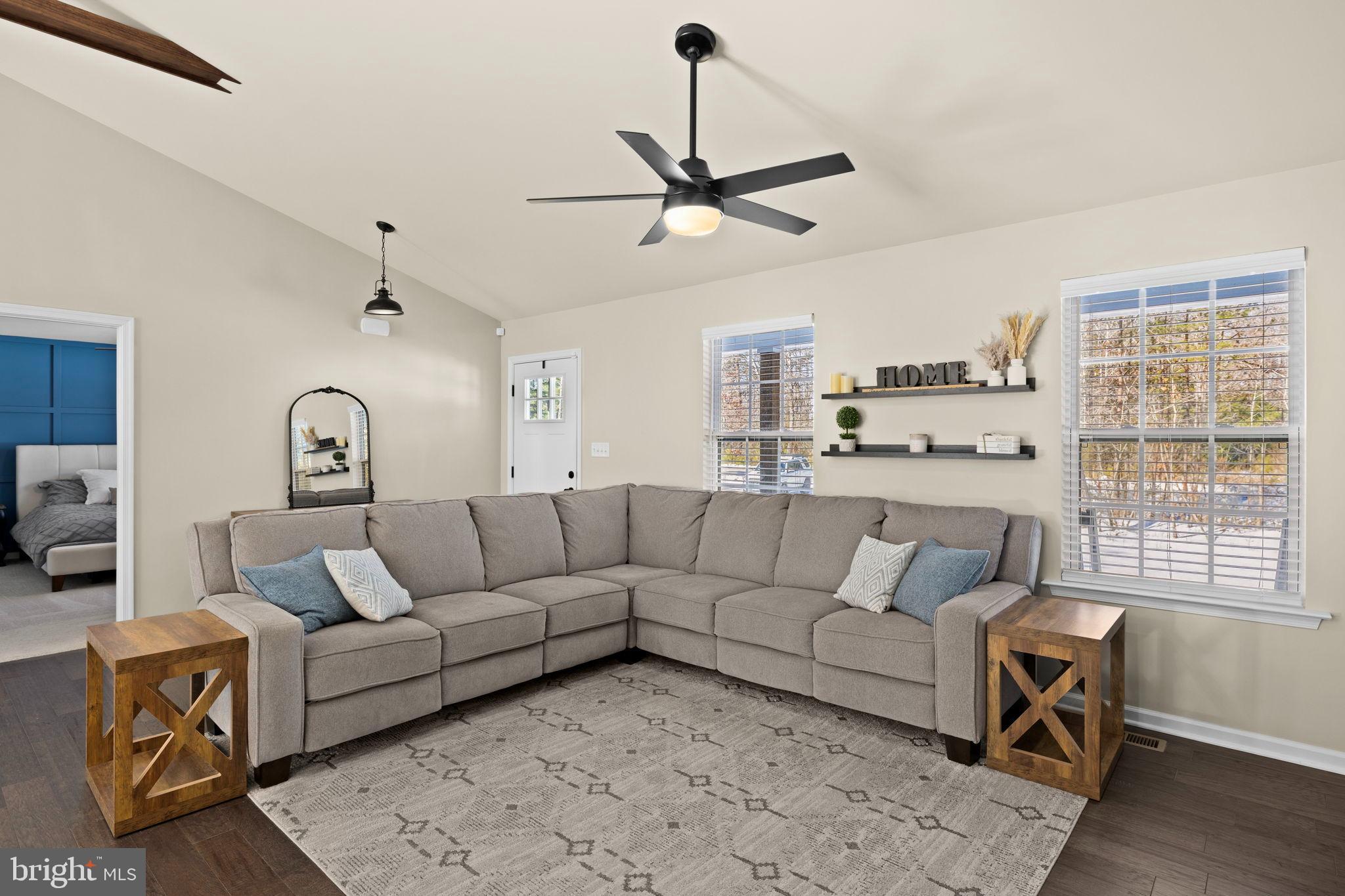 5269 Macedonia Road Woodford, VA 22580 - Photo 14 of 37 a living room with furniture and a large window