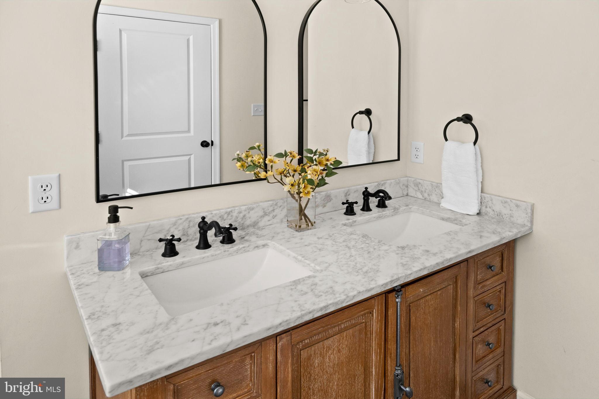 5269 Macedonia Road Woodford, VA 22580 - Photo 20 of 37 a bathroom with a sink and a mirror