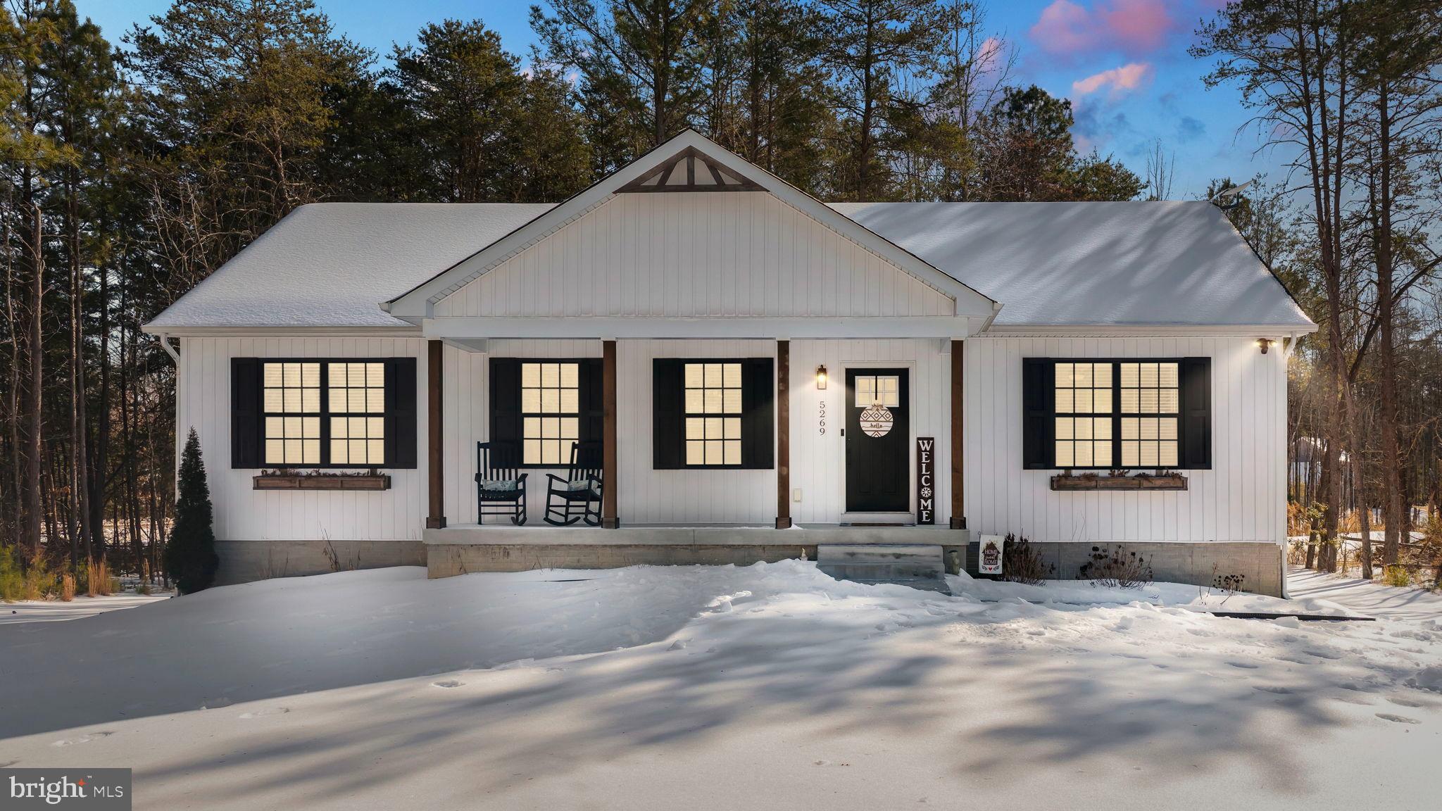 5269 Macedonia Road Woodford, VA 22580 - Photo 2 of 37 a front view of a house with a yard