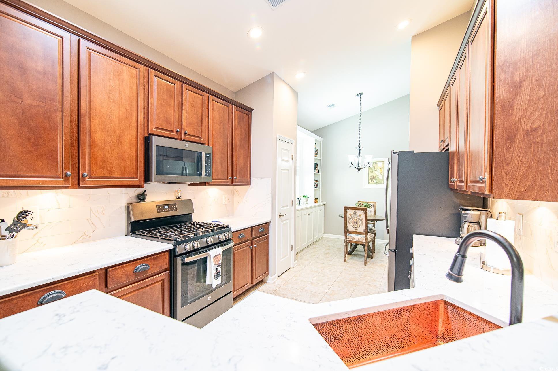 549 Grand Cypress Way Murrells Inlet, SC 29576 - Photo 10 of 40 Stainless Steel Appliances including a natural gas
