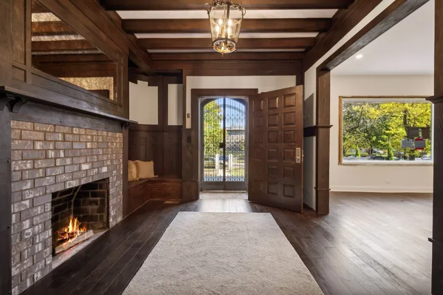 a view of a dining room with furniture wooden floor and chandelier
