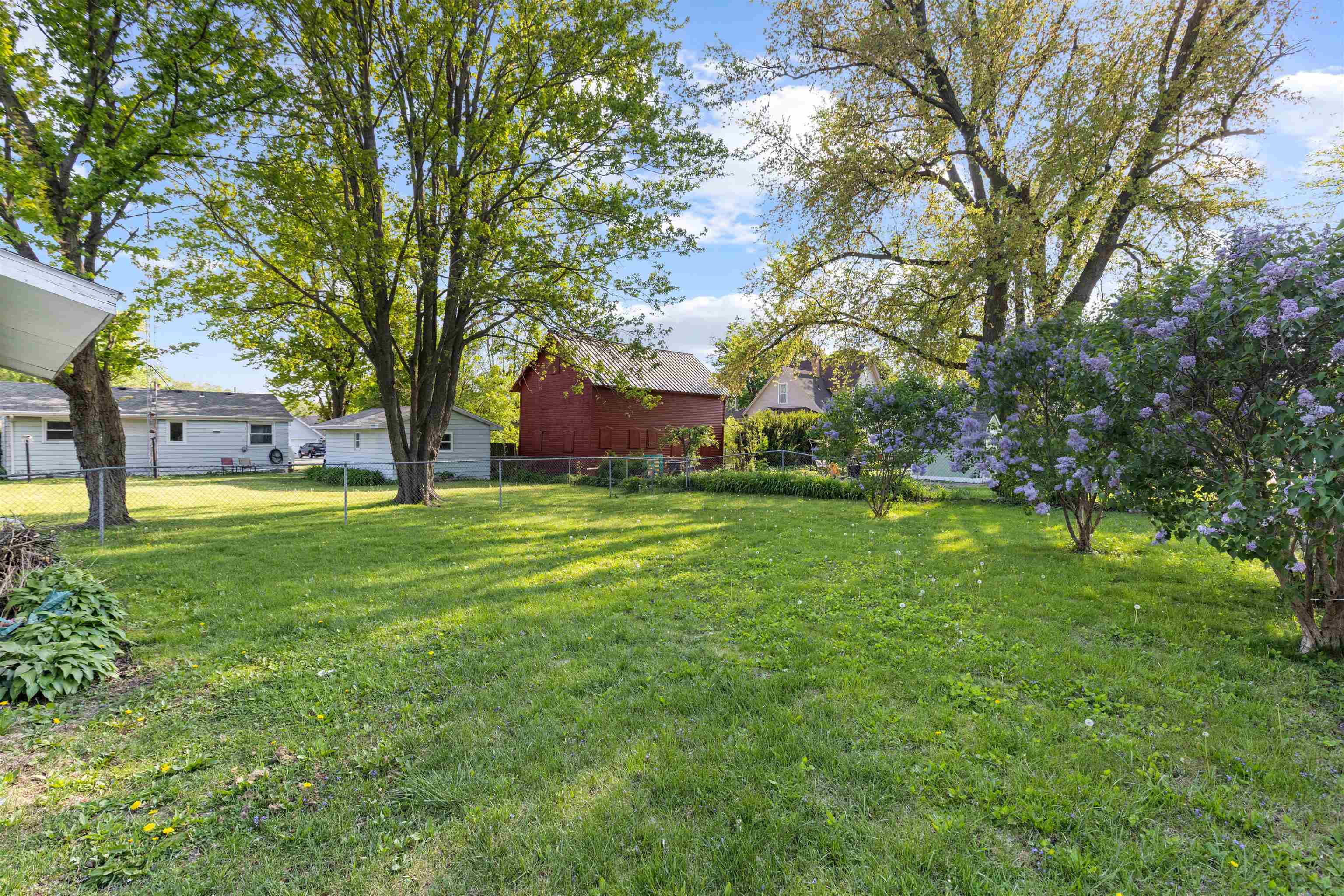 120 5th Street Capron, IL 61012 - Photo 13 of 13 a view of a house with a big yard