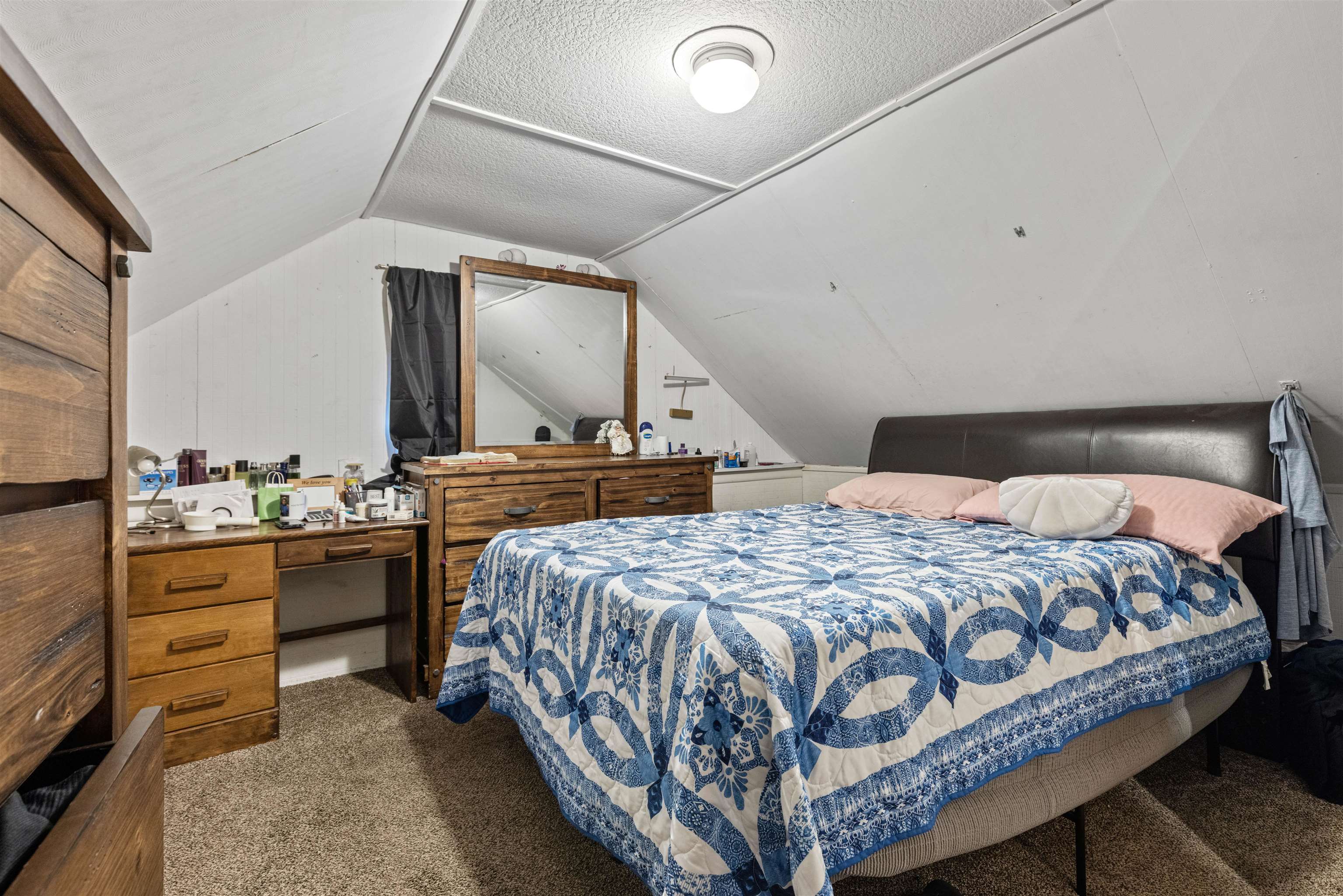 120 5th Street Capron, IL 61012 - Photo 8 of 13 a bedroom with a bed and dresser