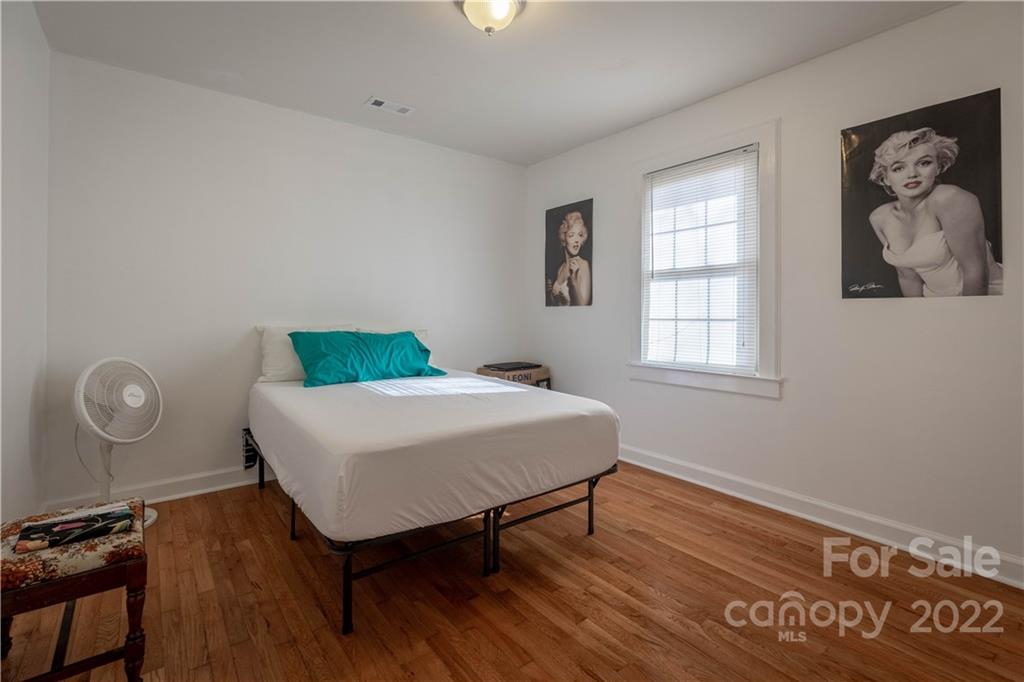 7680 Rhodhiss Road Connelly Springs, NC 28612 - Photo 11 of 25 a bedroom with a bed and a window