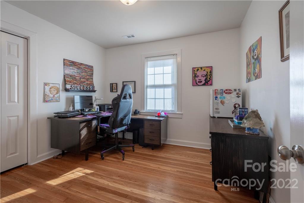7680 Rhodhiss Road Connelly Springs, NC 28612 - Photo 13 of 25 a view of a workspace with furniture and a window