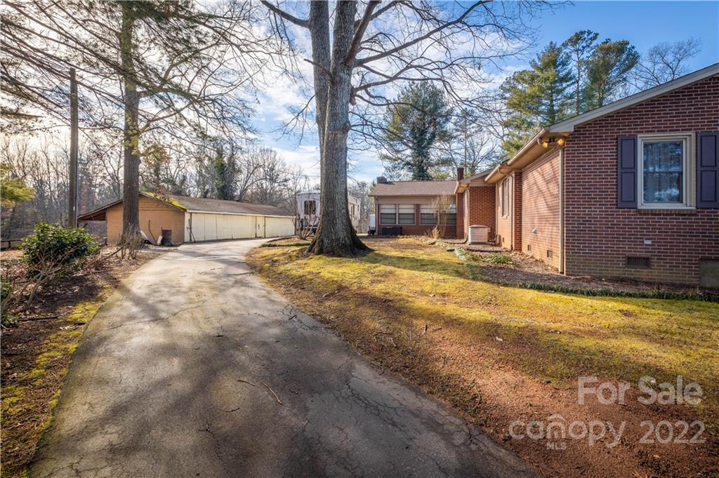 7680 Rhodhiss Road Connelly Springs, NC 28612 - Photo 17 of 25 a view of a house with a patio