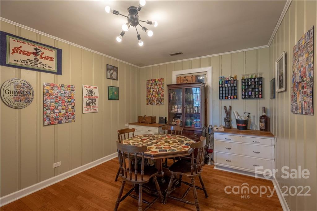 7680 Rhodhiss Road Connelly Springs, NC 28612 - Photo 7 of 25 a view of a dining room with furniture