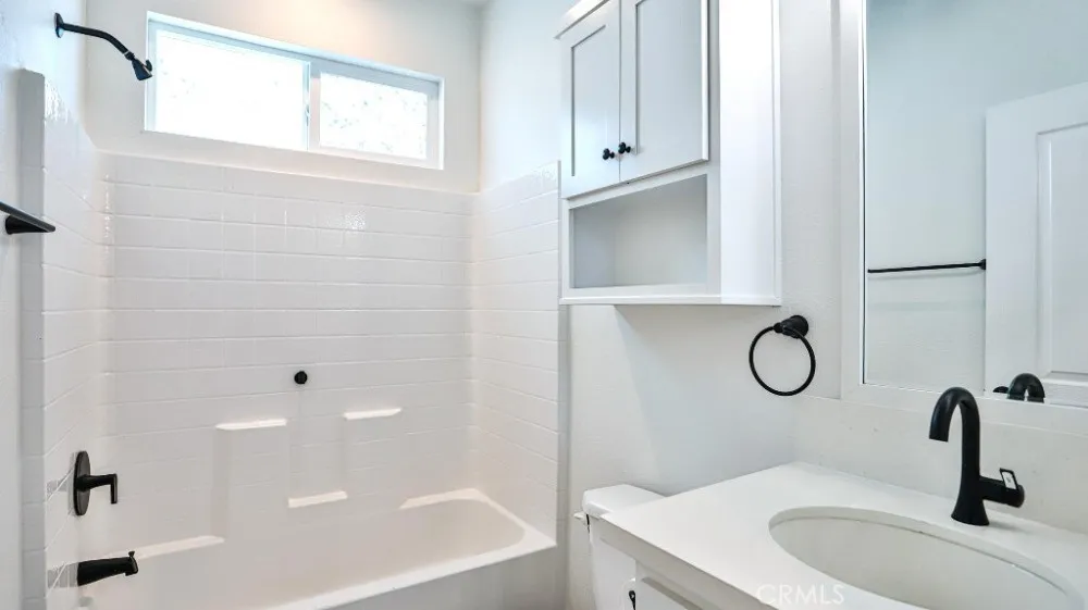 17700 Avalon, Unit 387 Carson, CA 90746 - Photo 13 of 28 a bathroom with a sink and a mirror