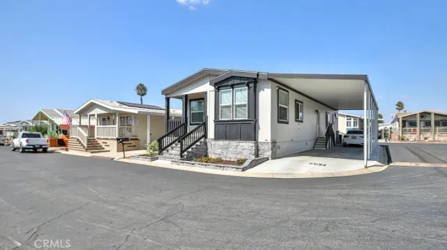 a front view of a house with a outdoor space