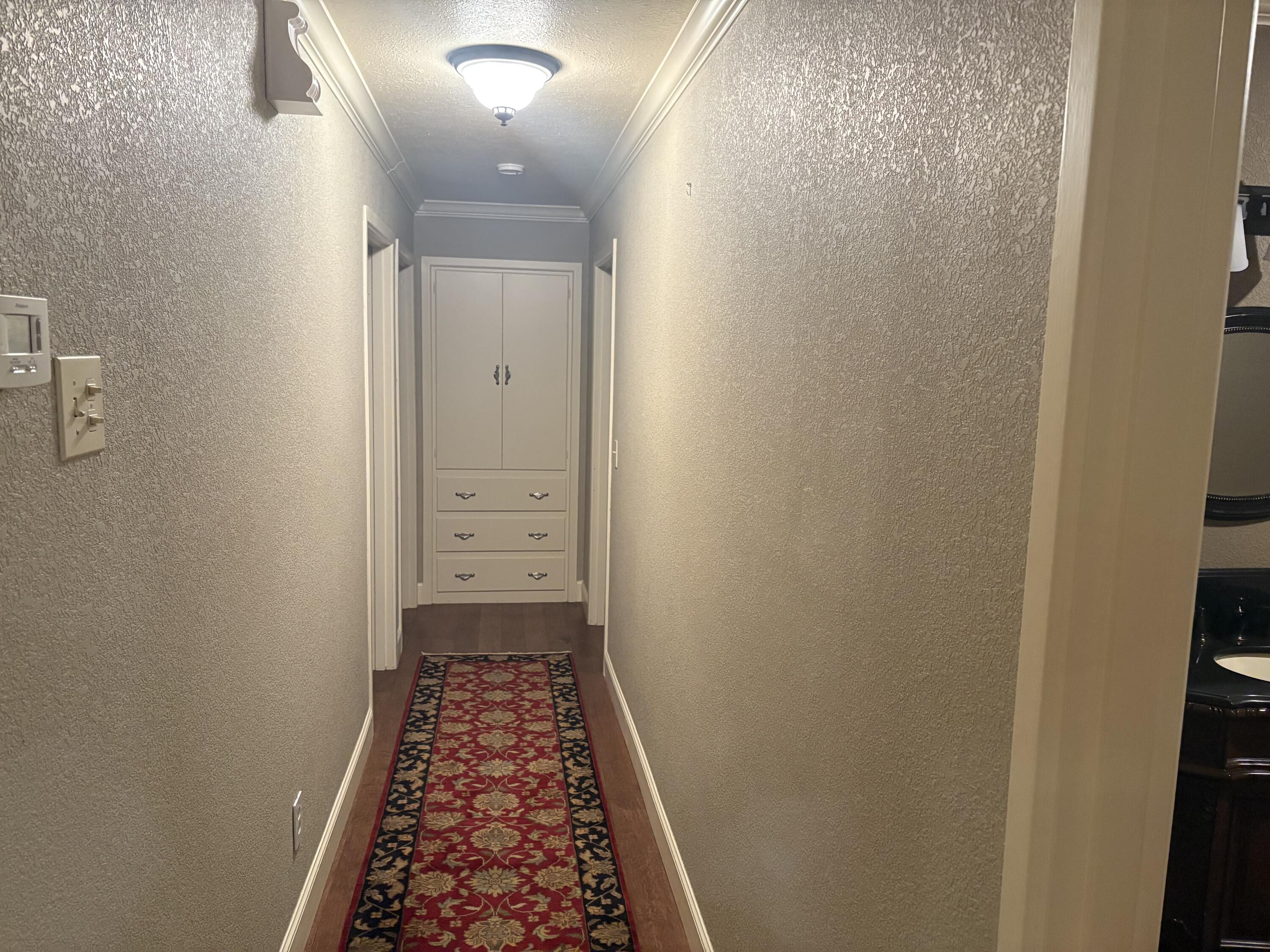 880 Highway 83 Loop, TX 79342 - Photo 10 of 34 Hall to Bedrooms