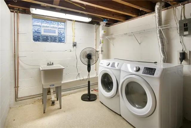 a utility room with dryer and washer
