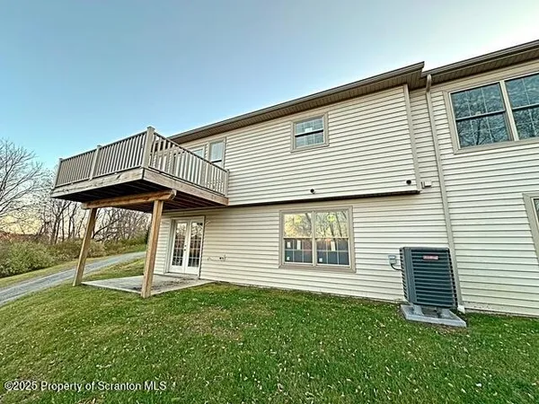 a view of a house with a deck