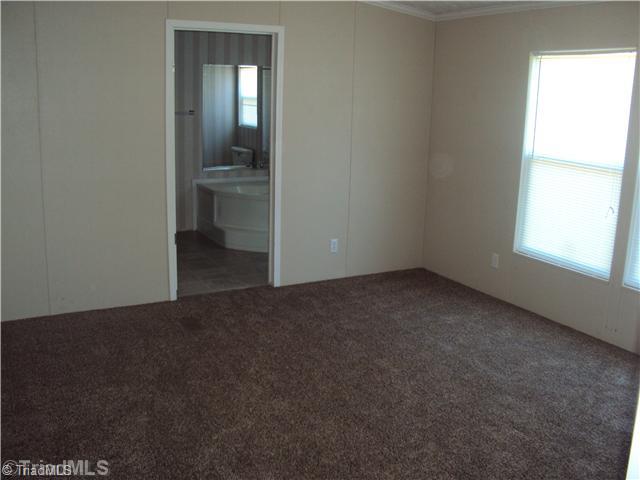 1068 Loblolly Road Madison, NC 27025 - Photo 7 of 11 Master Bedroom.