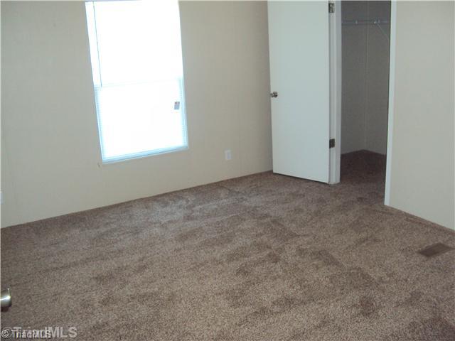 1068 Loblolly Road Madison, NC 27025 - Photo 9 of 11 2nd Bedroom.