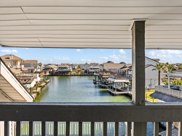 a view of a lake from a balcony