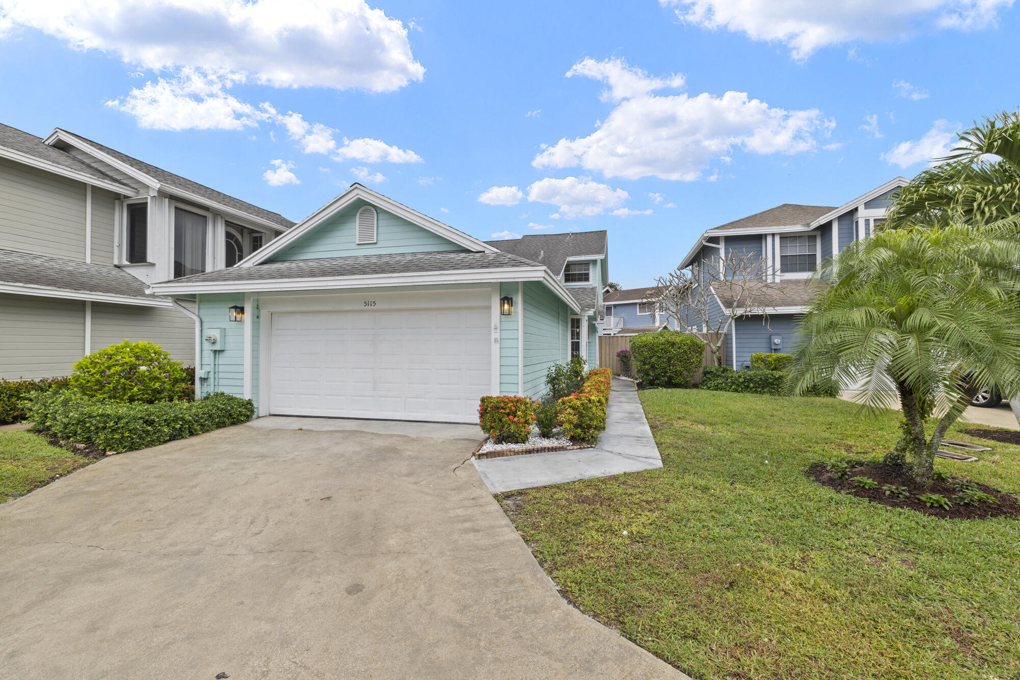 front view of a house with a yard