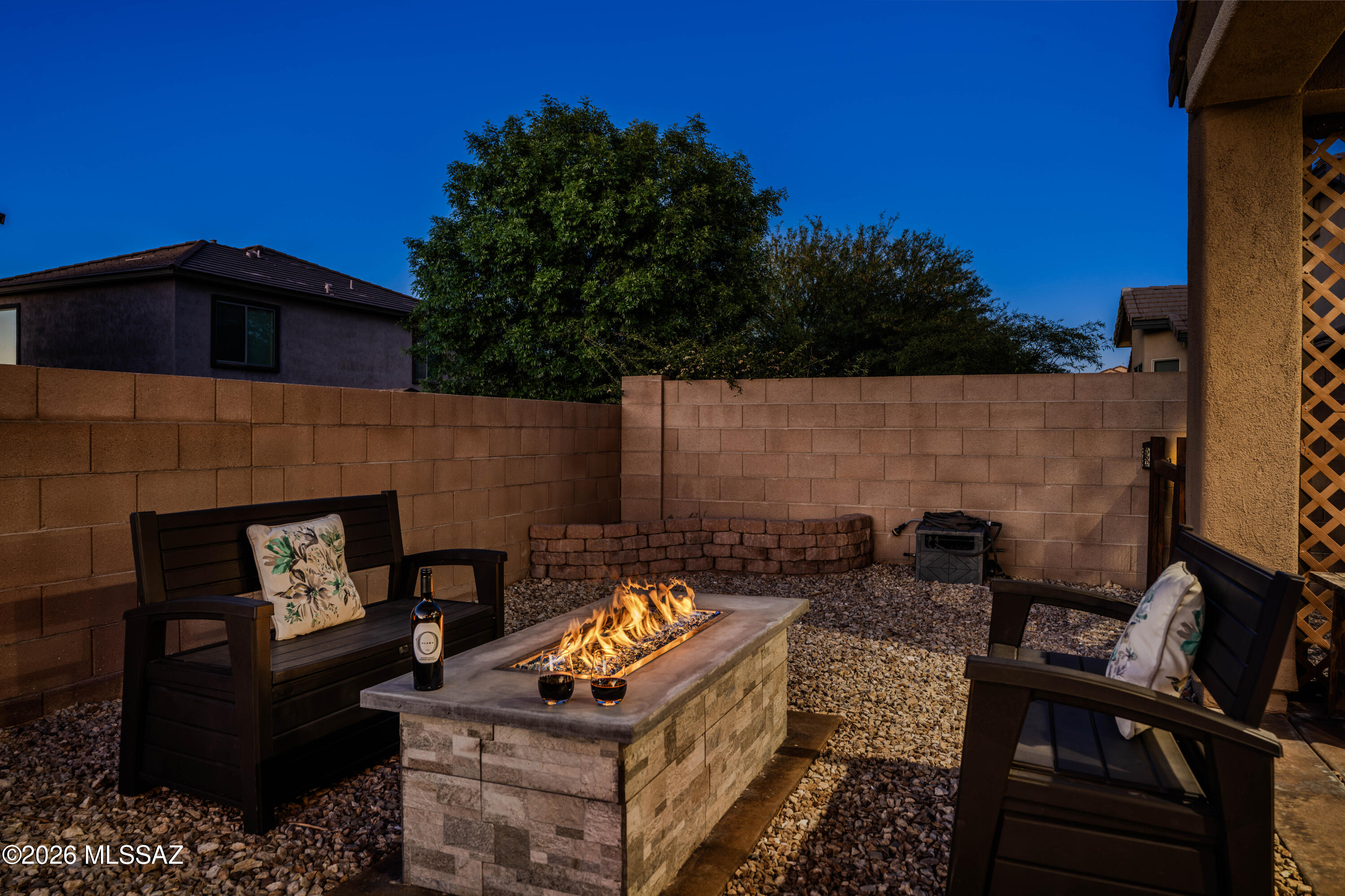 211 East Refuge Loop Vail, AZ 85641 - Photo 36 of 48 a view of a patio with couches table and chairs with potted plants