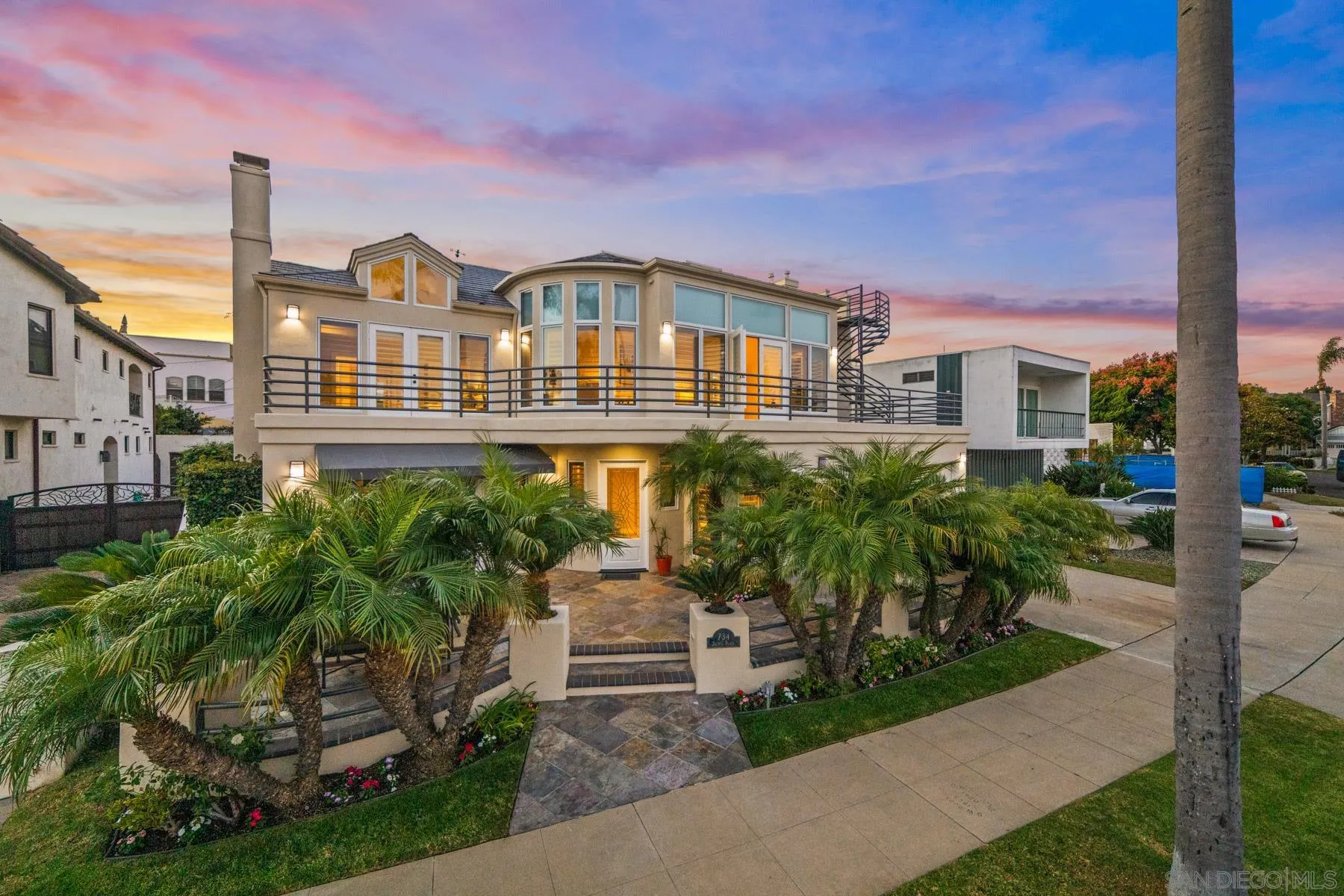 734 Jacinto Place Coronado, CA 92118 - Photo 1 of 1 a front view of a house with a yard