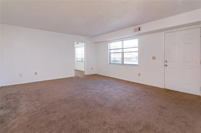 $215,000 | 81 Windtree Lane, Unit 104, Winter Garden, FL 34787