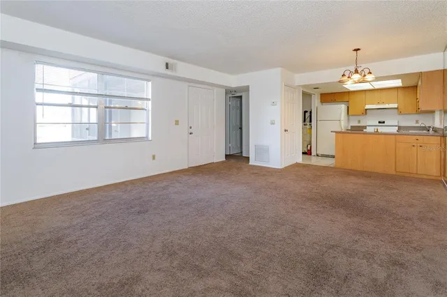 $215,000 | 81 Windtree Lane, Unit 104, Winter Garden, FL 34787