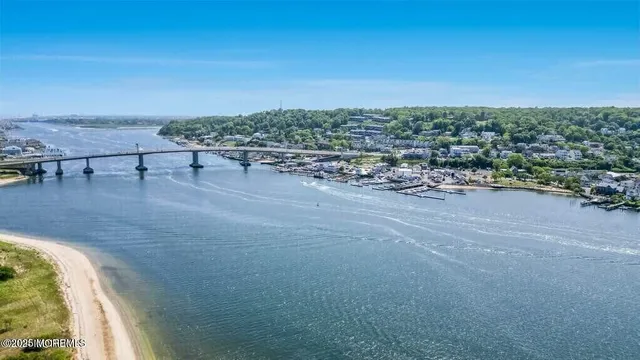 a view of a lake with a yard