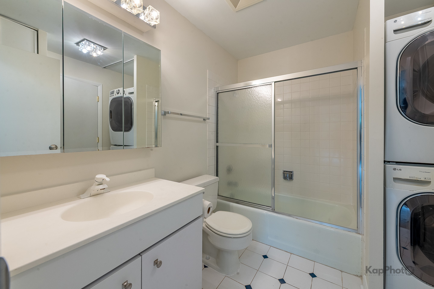 120 Lakeview Drive, Unit 318 Bloomingdale, IL 60108 - Photo 18 of 31 a bathroom with a sink a toilet and shower
