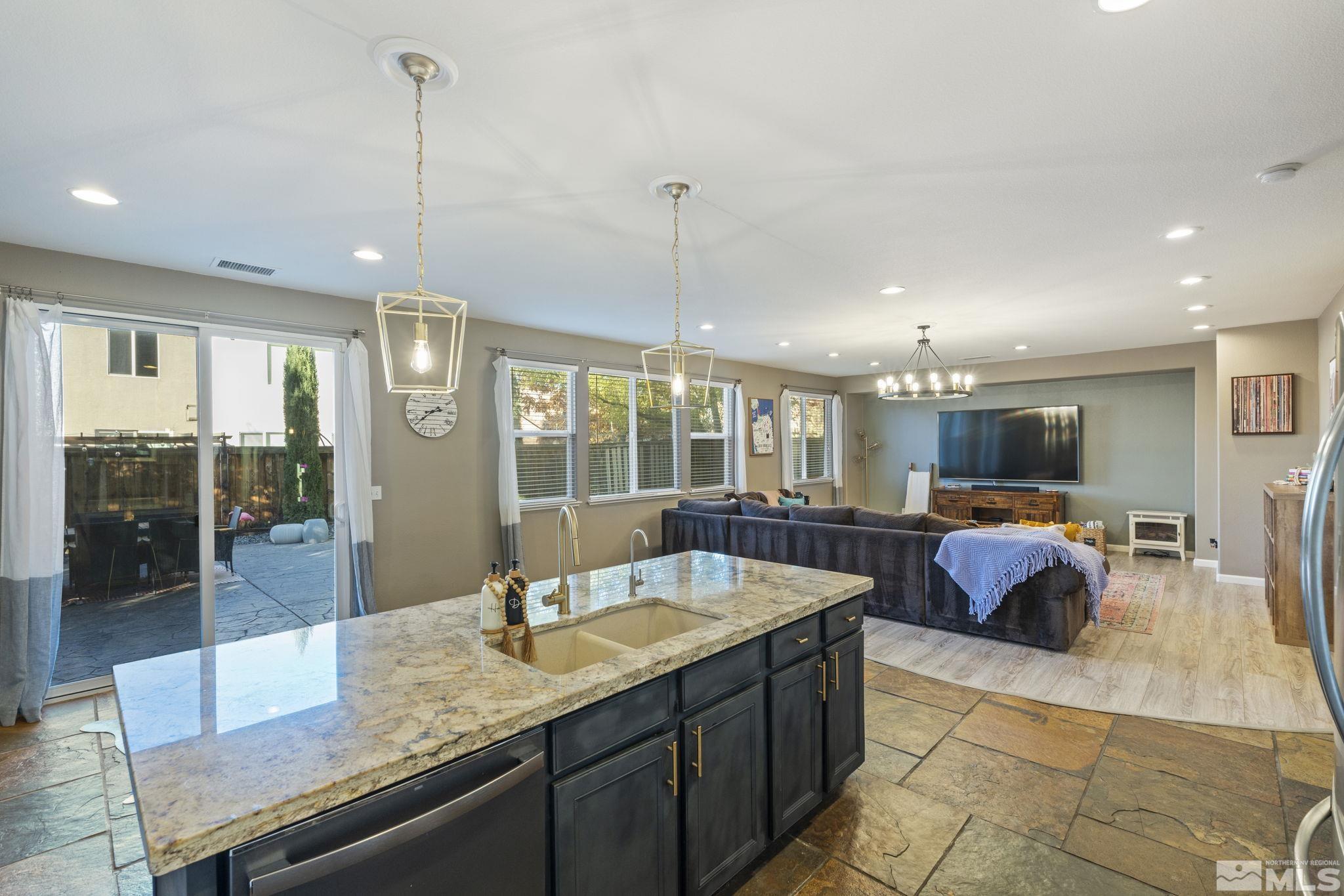 405 Teramo Court Reno, NV 89521 - Photo 12 of 40 a view of living room with furniture and window