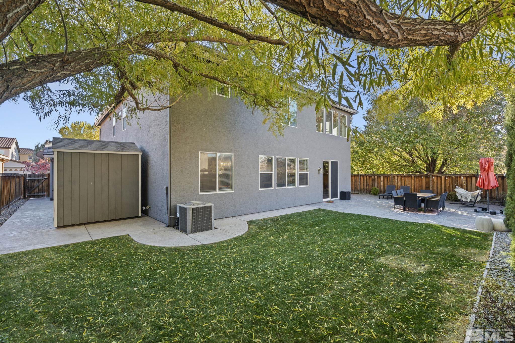 405 Teramo Court Reno, NV 89521 - Photo 33 of 40 a front view of a house with garden