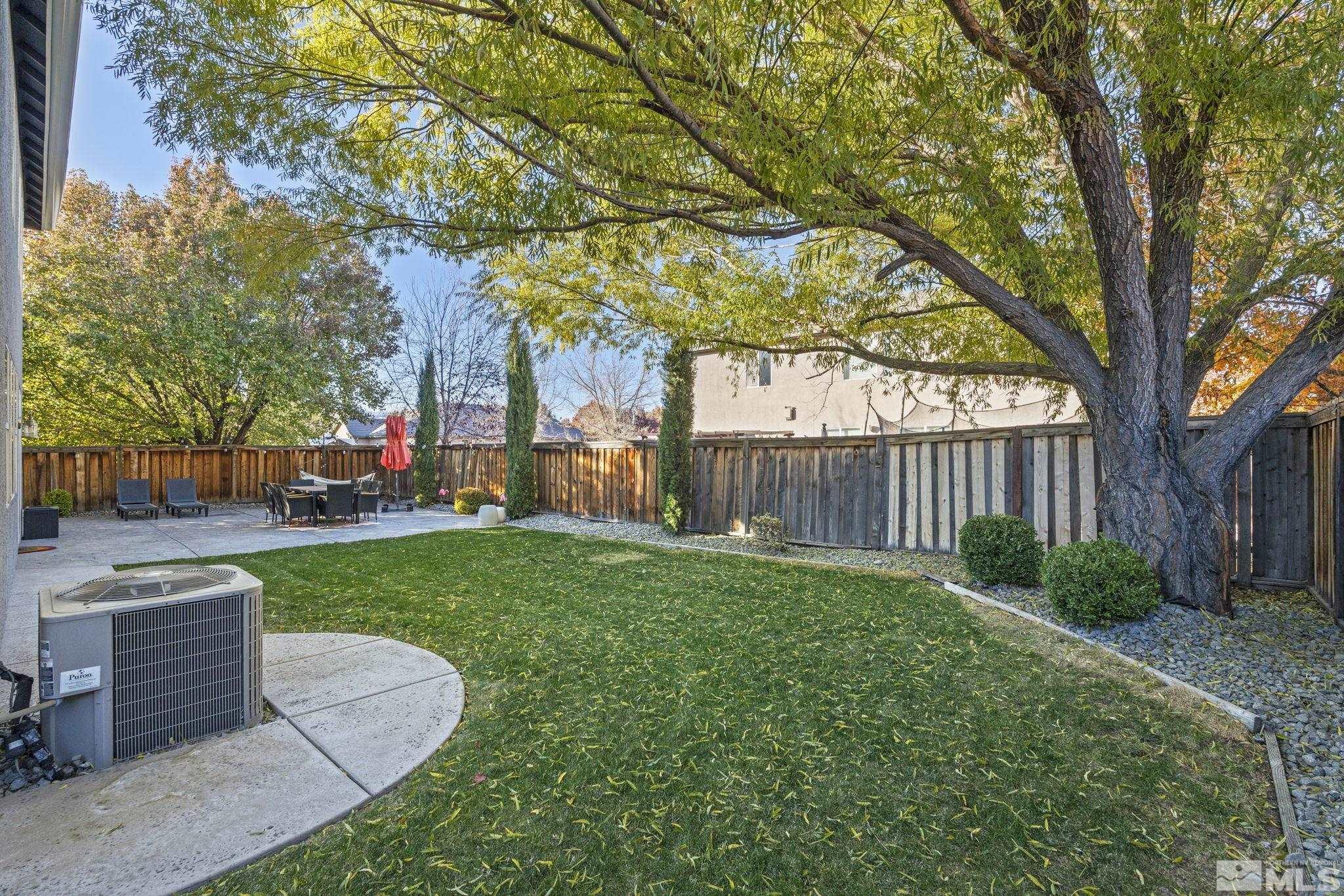405 Teramo Court Reno, NV 89521 - Photo 35 of 40 a view of a garden with trees
