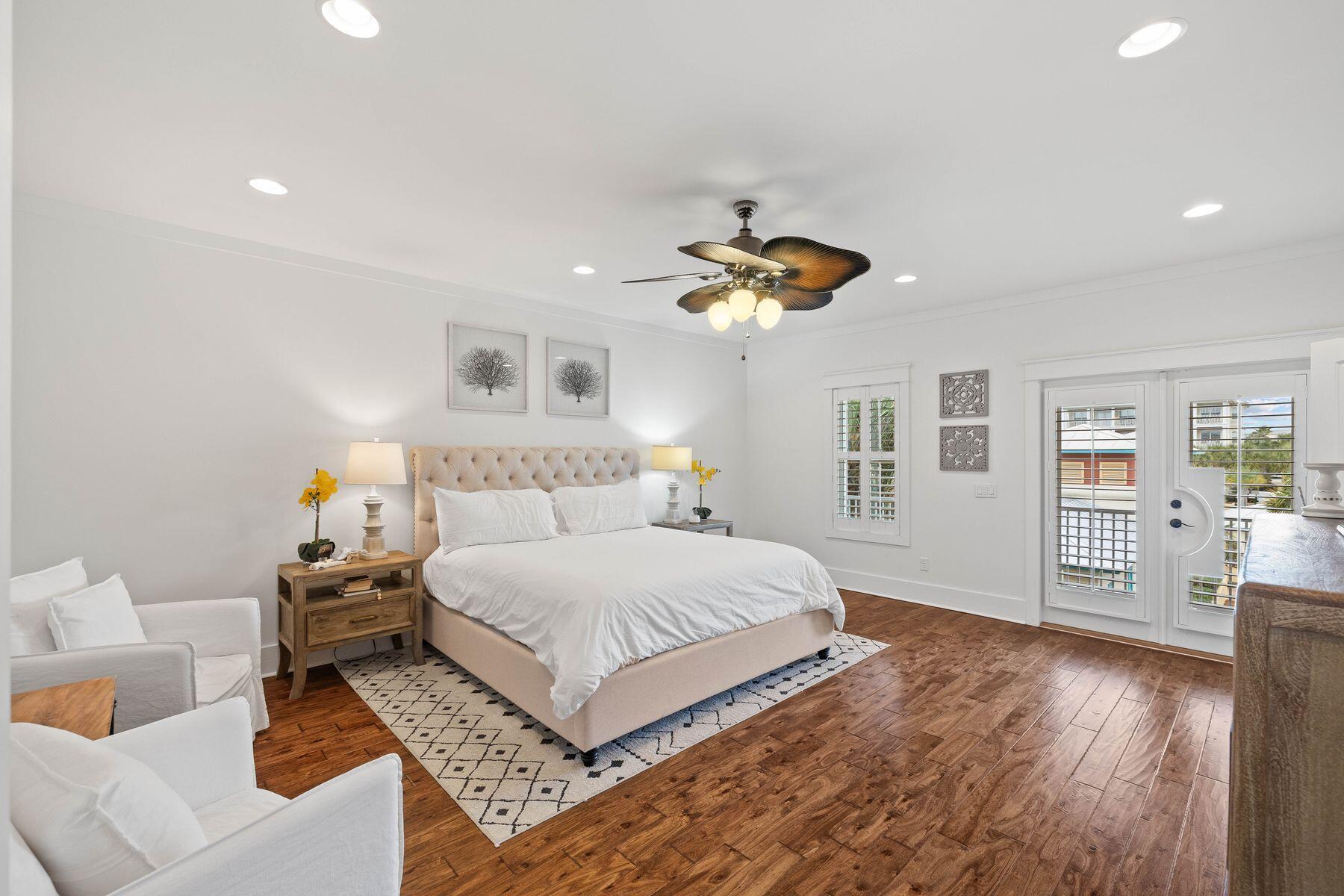 41 West Cobia Run Inlet Beach Inlet Beach, FL 32461 - Photo 11 of 32 a bedroom with a large bed and a chandelier