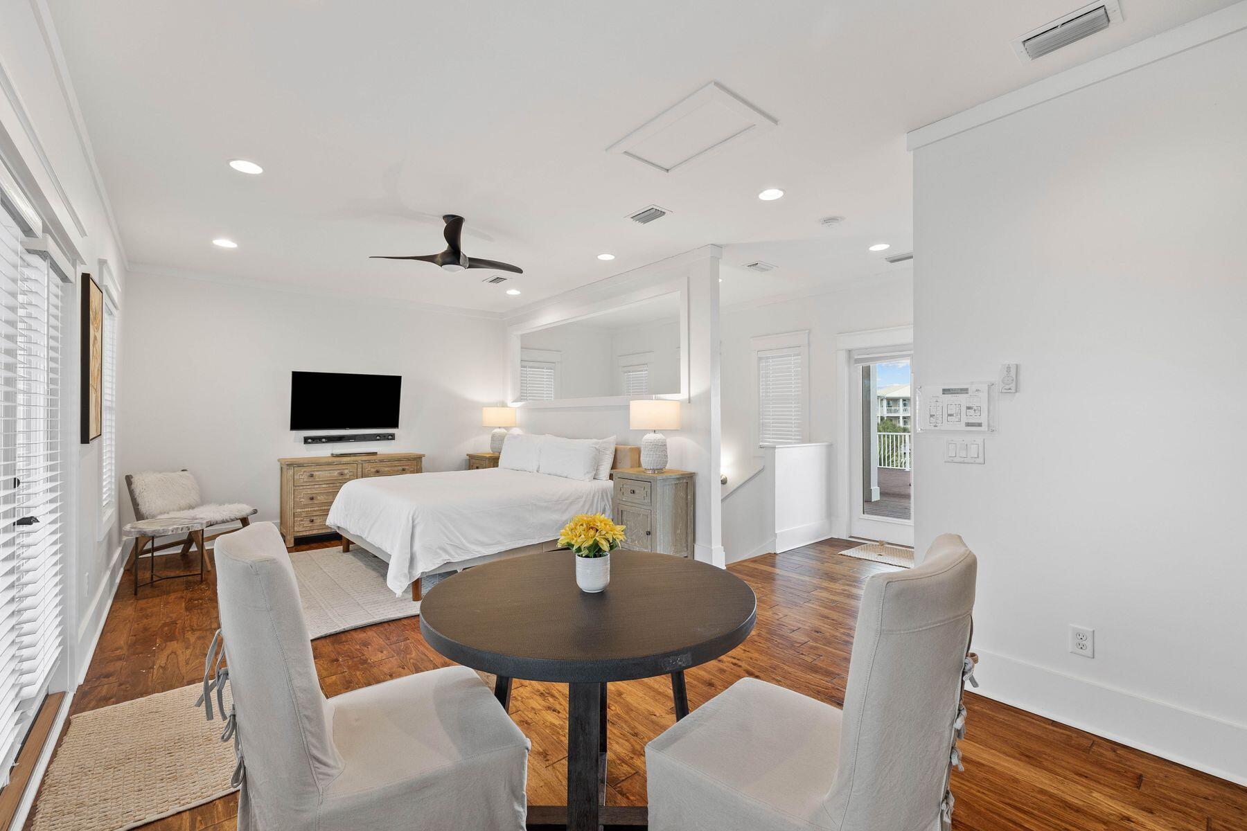 41 West Cobia Run Inlet Beach Inlet Beach, FL 32461 - Photo 19 of 32 a living room with furniture a flat screen tv and kitchen view