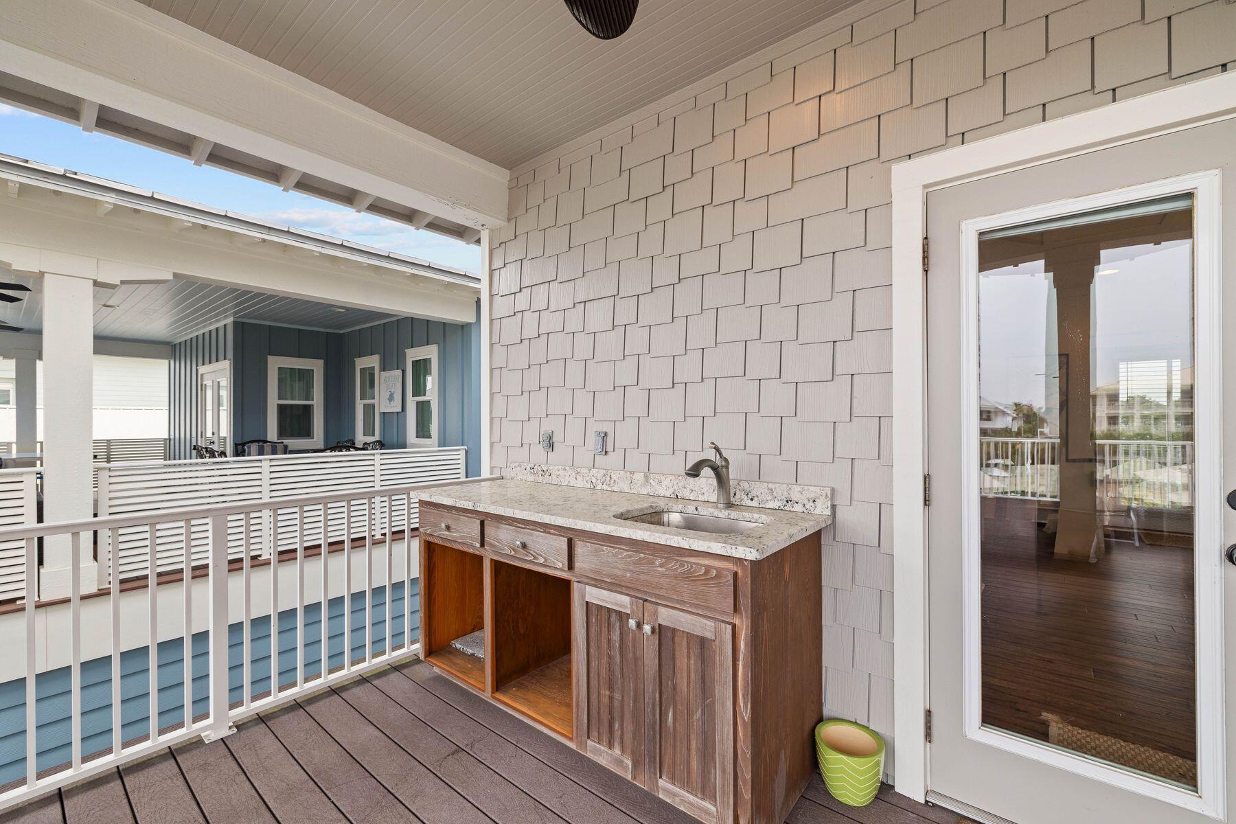 41 West Cobia Run Inlet Beach Inlet Beach, FL 32461 - Photo 22 of 32 a bathroom with a sink and a mirror