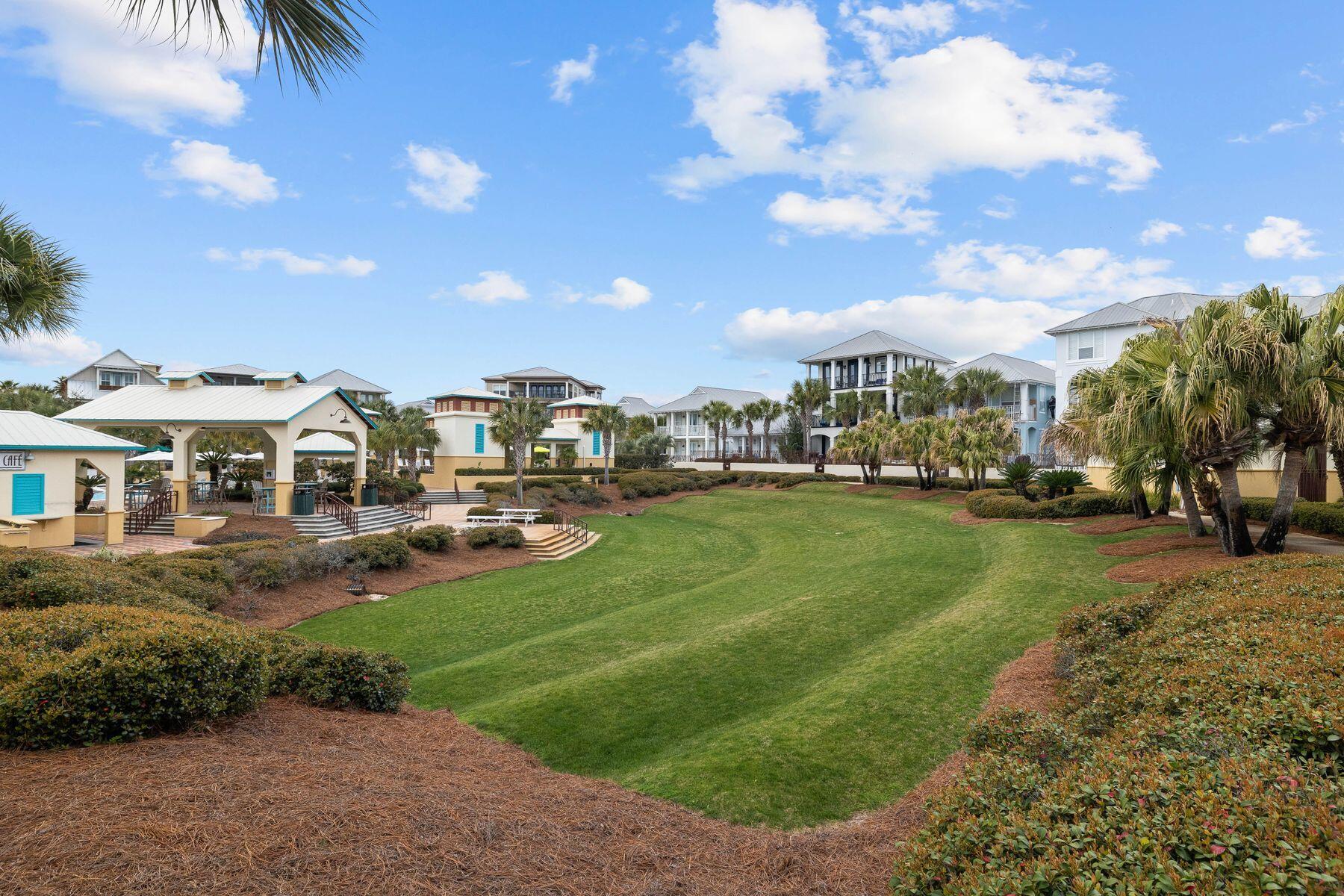 41 West Cobia Run Inlet Beach Inlet Beach, FL 32461 - Photo 29 of 32 a view of a big yard with cars parked in front of it