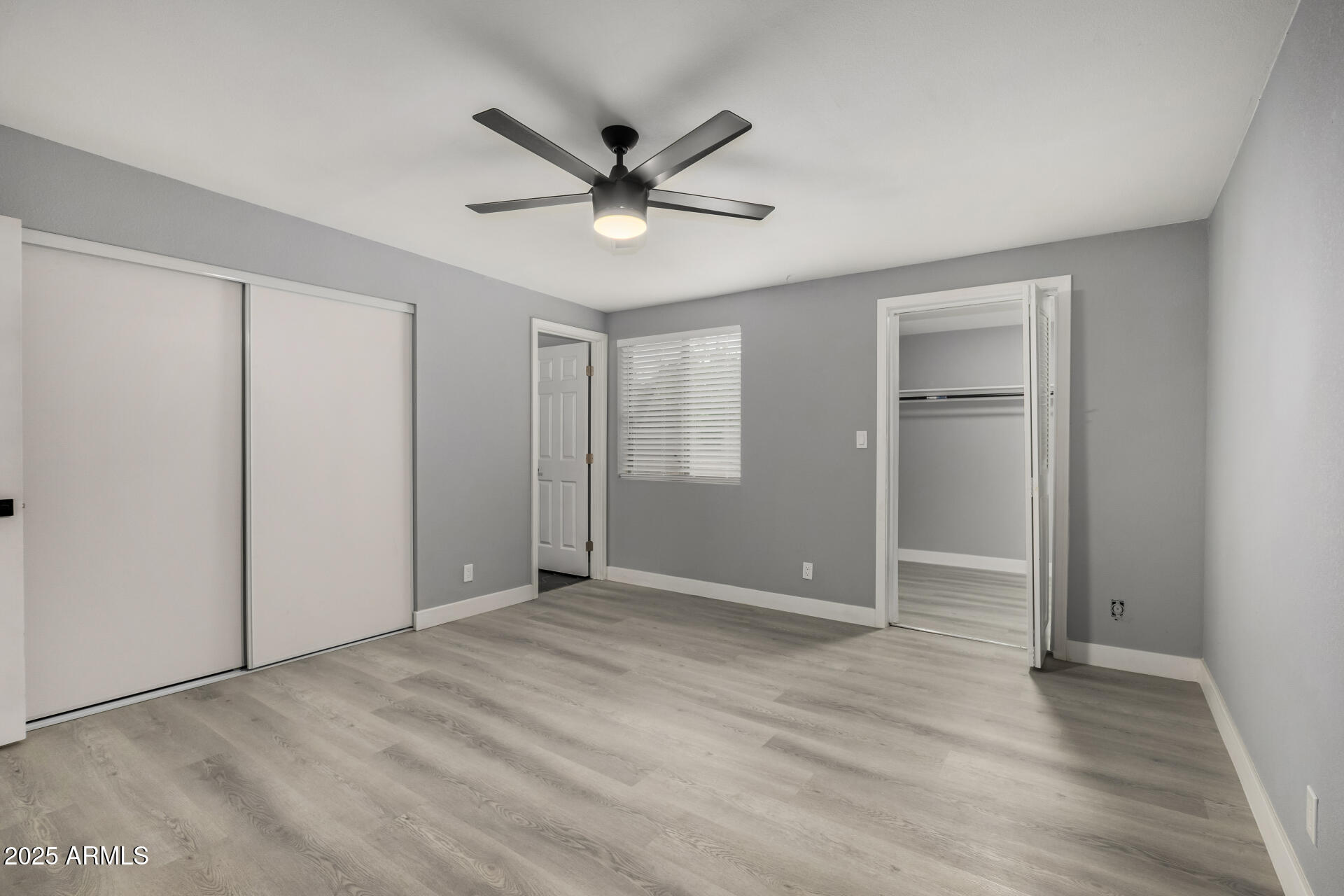 3619 West Griswold Road Phoenix, AZ 85051 - Photo 16 of 36 a view of an empty room with a window