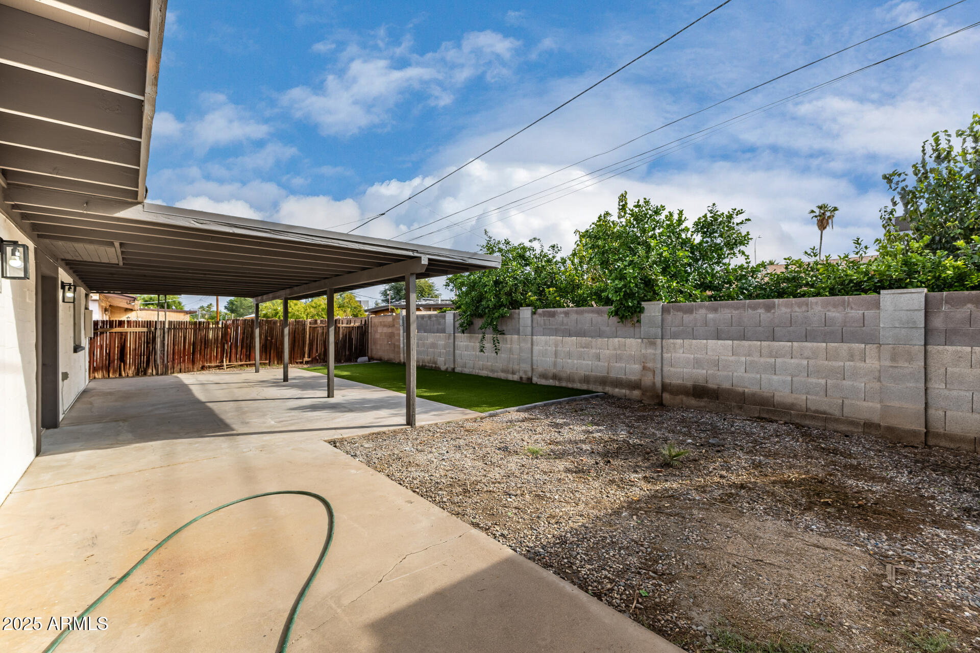 3619 West Griswold Road Phoenix, AZ 85051 - Photo 33 of 36 a view of a backyard