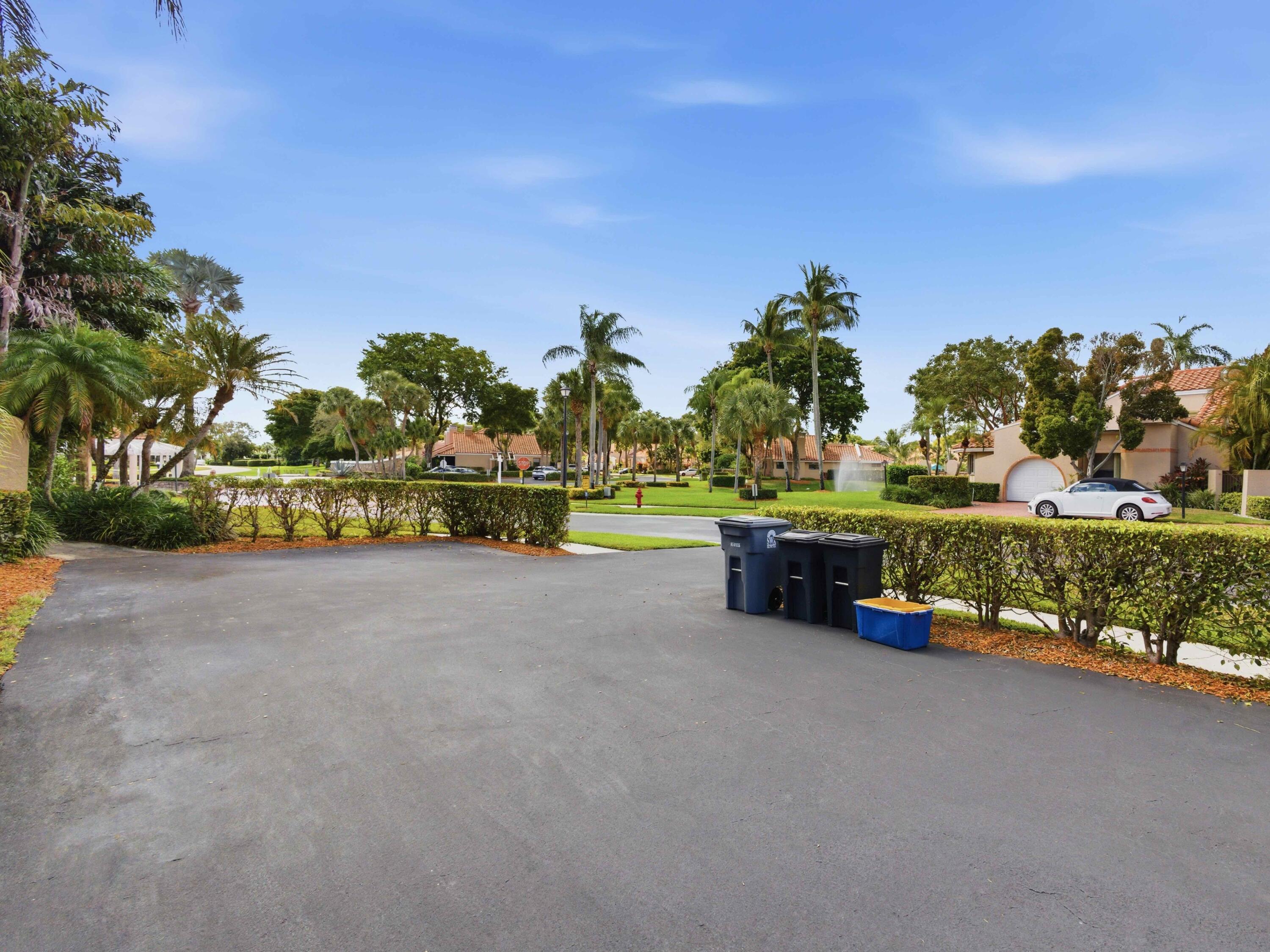 22511 Meridiana Drive Boca Raton, FL 33433 - Photo 26 of 40 a view of a park with large trees