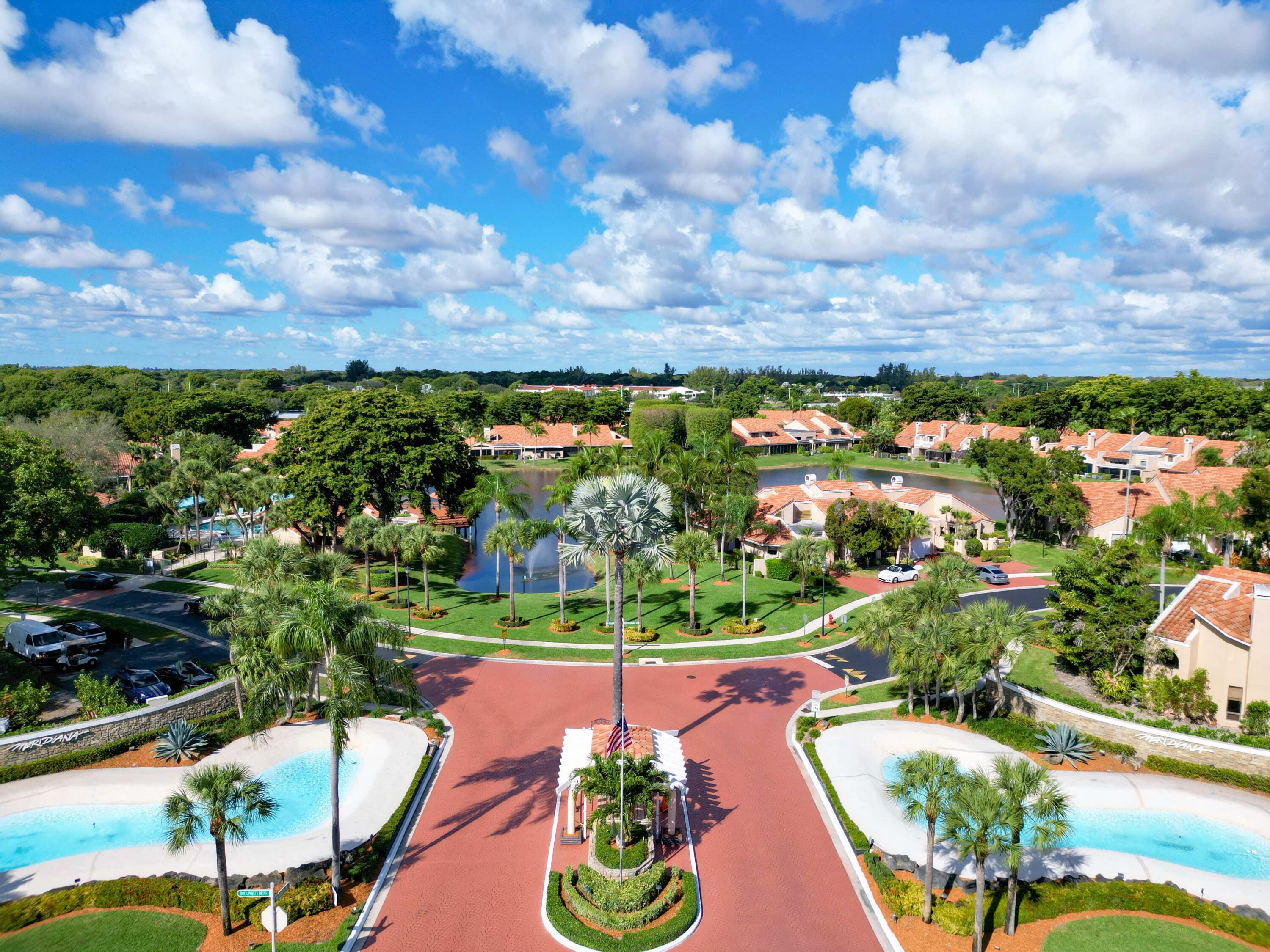 22511 Meridiana Drive Boca Raton, FL 33433 - Photo 37 of 40 a view of a city with flower plants