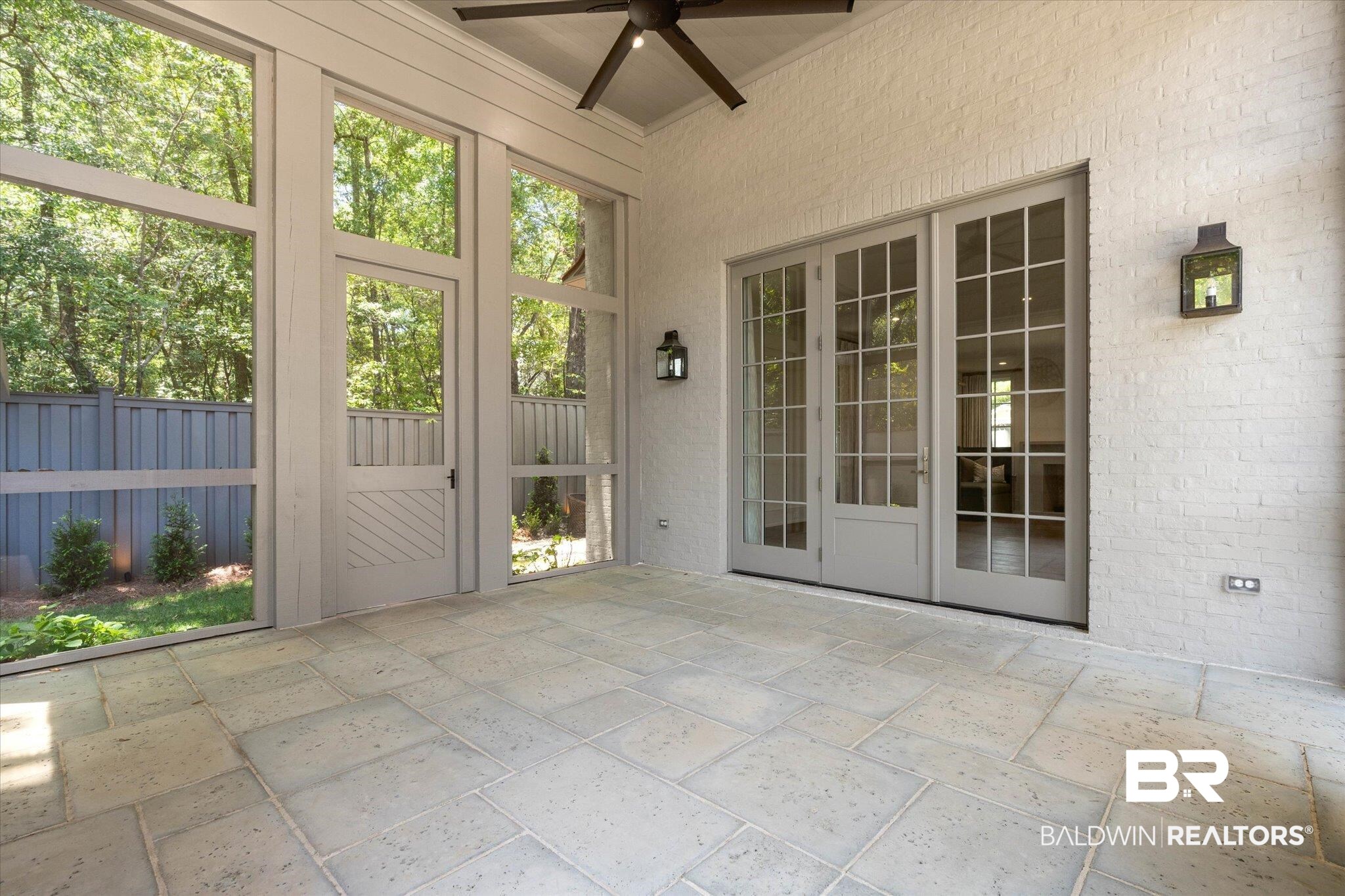 3 Canterbury Park Mobile, AL 36608 - Photo 14 of 43 Unfurnished sunroom with a ceiling fan and french doors