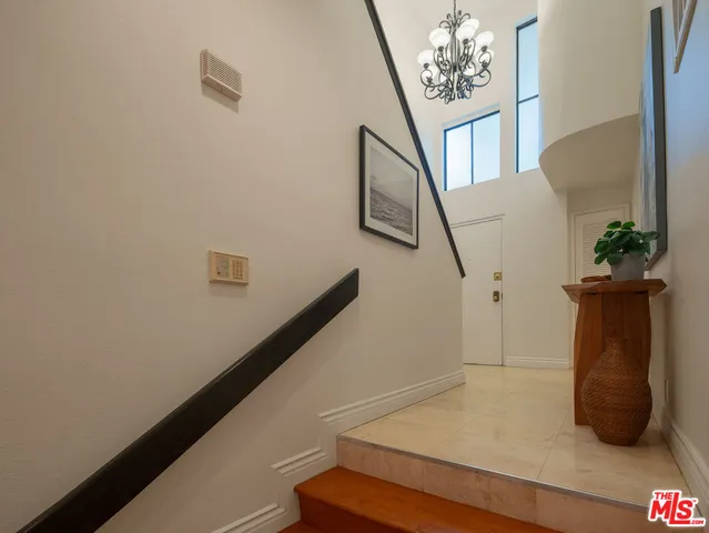 a view of entryway and workspace