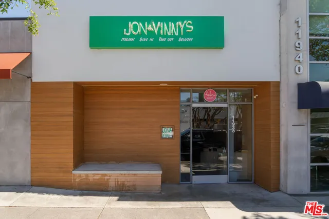 a front view of a building with patio