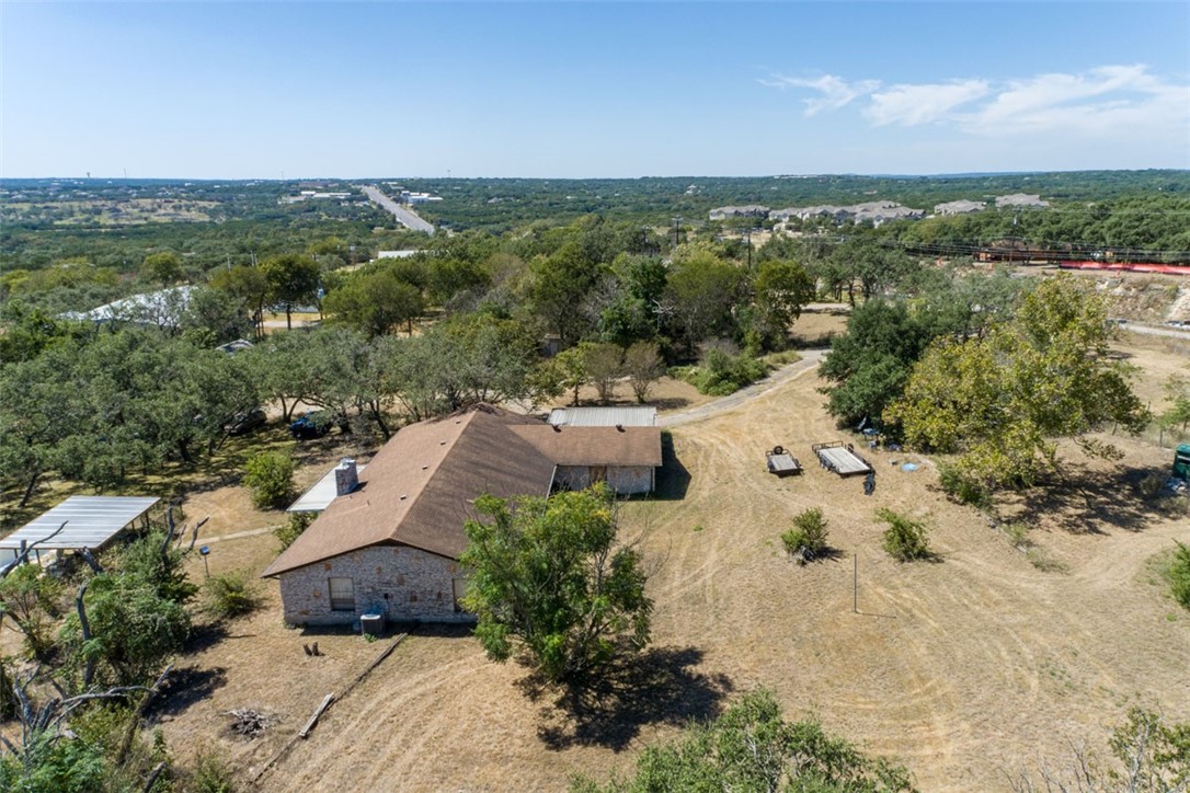 8701 Highway 290 Austin, TX 78737 - Photo 19 of 40 an aerial view of a house with a yard