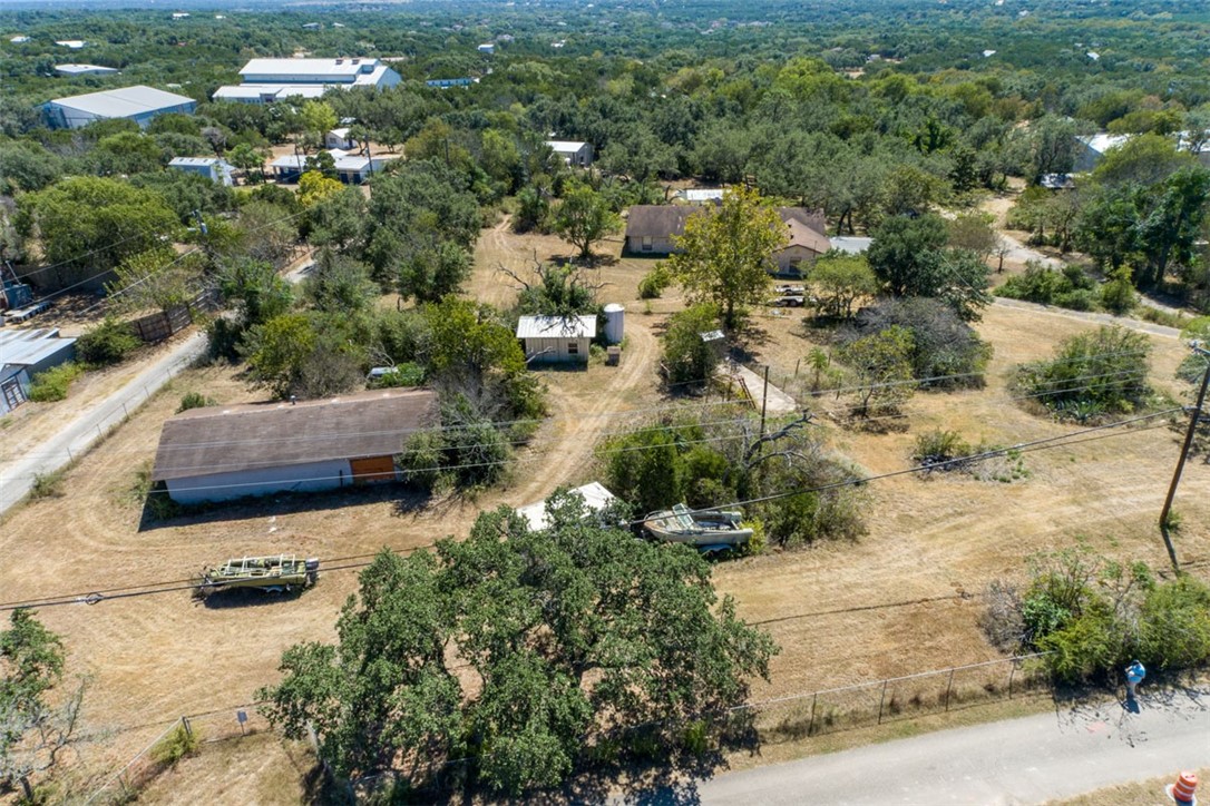 8701 Highway 290 Austin, TX 78737 - Photo 20 of 40 an aerial view of residential houses with outdoor space and trees