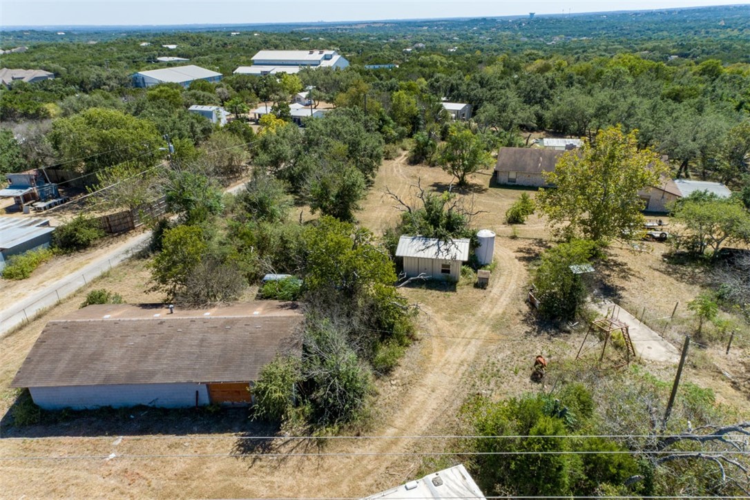 8701 Highway 290 Austin, TX 78737 - Photo 24 of 40 an aerial view of a house with a yard