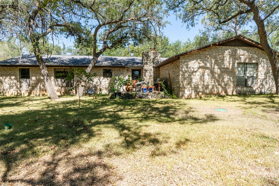 8701 Highway 290 Austin, TX 78737 - Photo 3 of 40 a view of a house with a yard