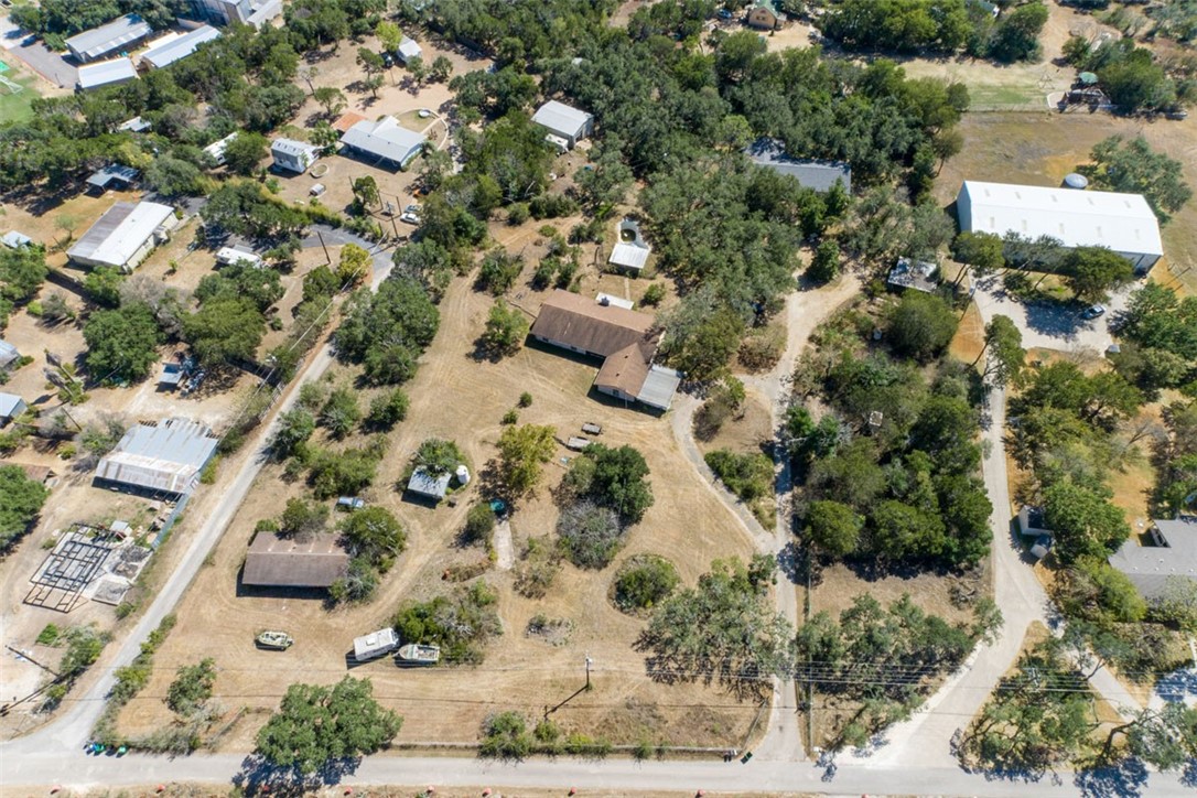 8701 Highway 290 Austin, TX 78737 - Photo 36 of 40 an aerial view of residential houses with outdoor space