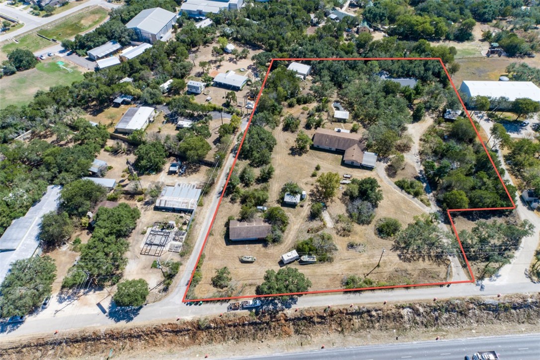 8701 Highway 290 Austin, TX 78737 - Photo 38 of 40 an aerial view of residential houses with outdoor space