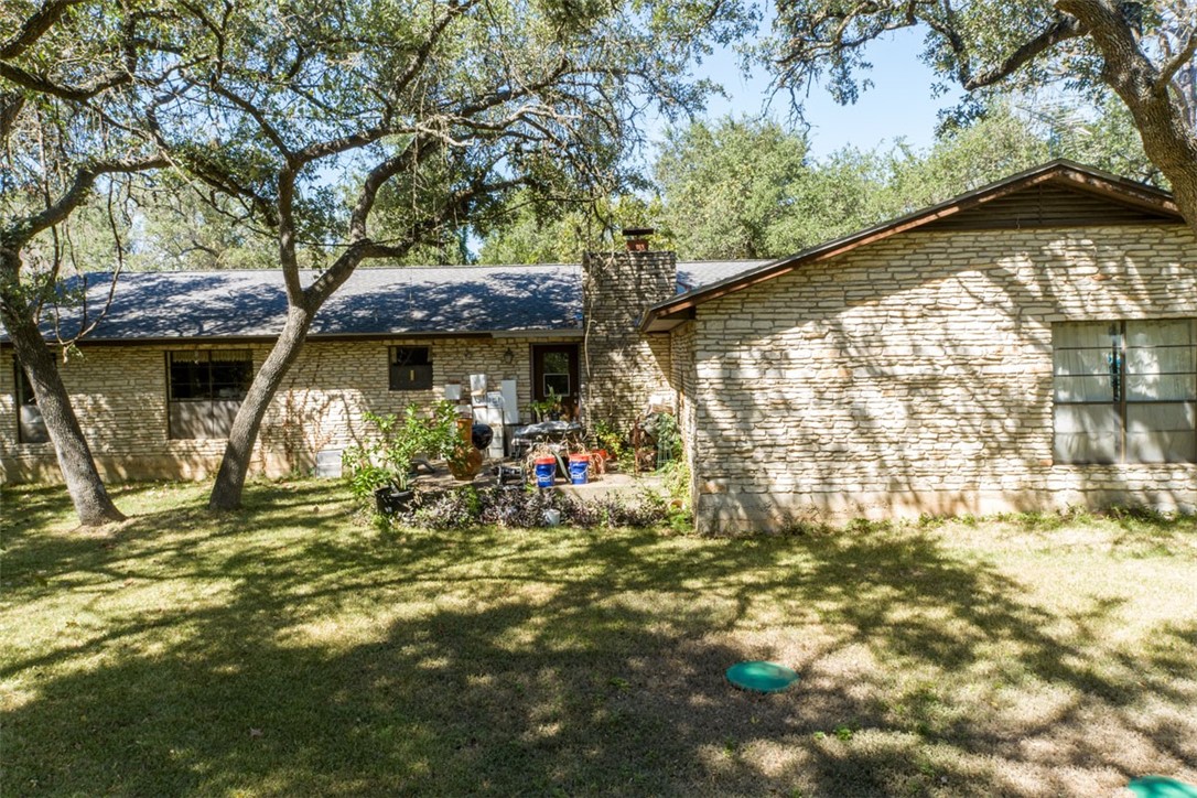 8701 Highway 290 Austin, TX 78737 - Photo 6 of 40 a view of a chair and table in the patio