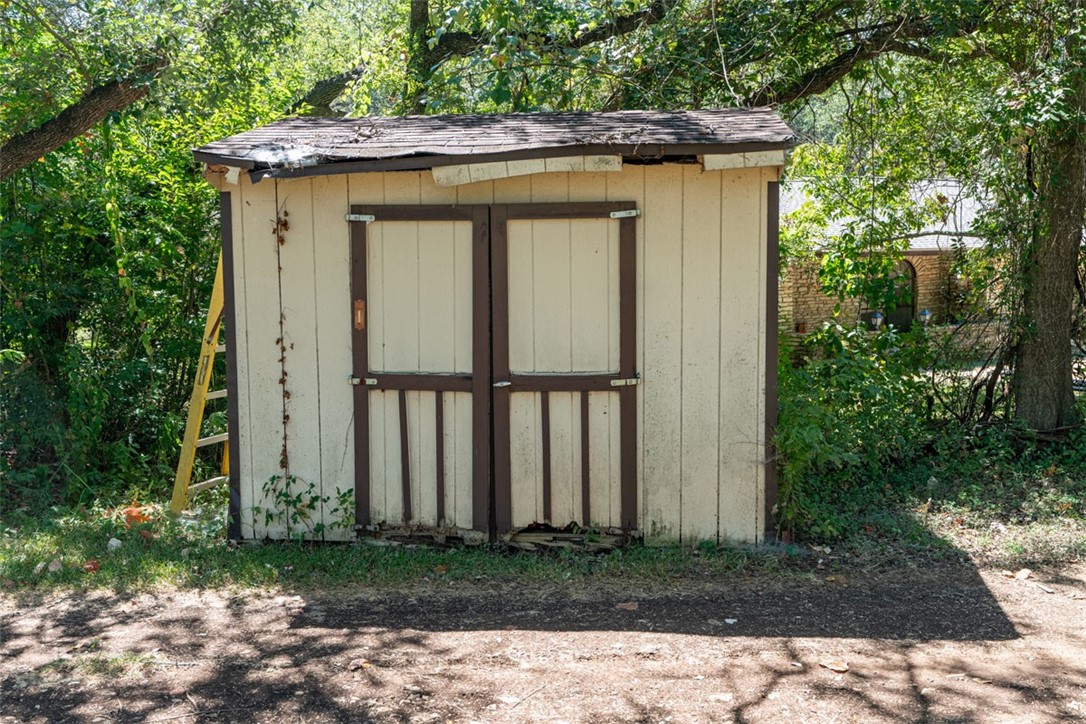 8701 Highway 290 Austin, TX 78737 - Photo 9 of 40 a view of a house with a yard